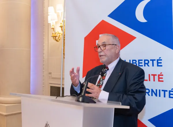 E. Dr. Mohammad Alissa attended the Paris Peace and Solidarity Agreement