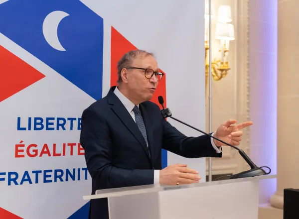 E. Dr. Mohammad Alissa attended the Paris Peace and Solidarity Agreement