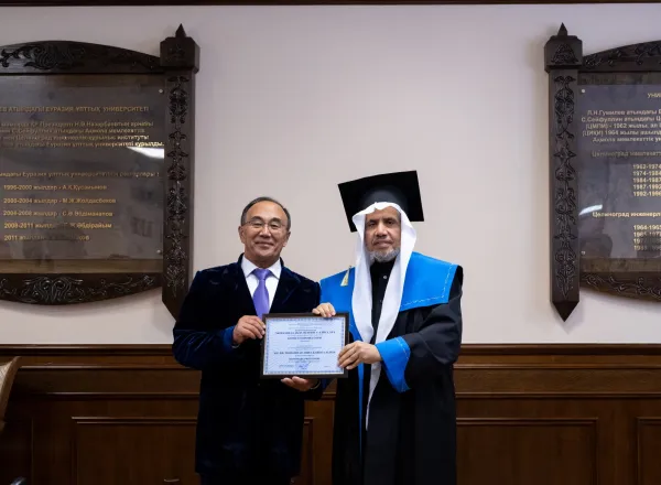 was subsequently awarded an honorary doctorate and an honorary professorship, in the presence of the rector of the university